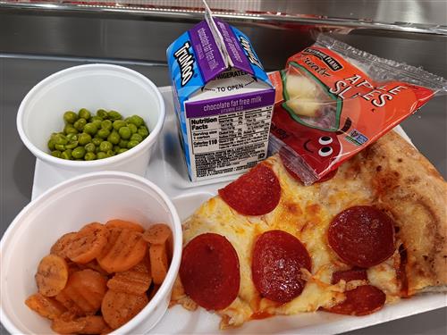 Pizza, carrots, peas, chocolate milk, apple slices