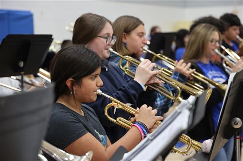 band members play their instuments