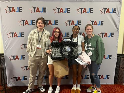 Chisholm Trail High School Yearbook students and teacher