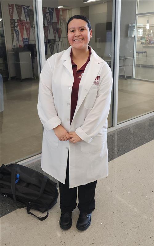 A girl in a lab coat