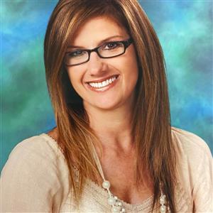 Amy Erb portrait on blue background
