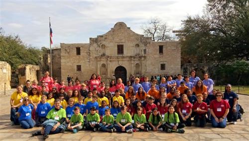 Bryson Elementary fourth-graders pose for a picture in front of the Alamo in San Antonio. 