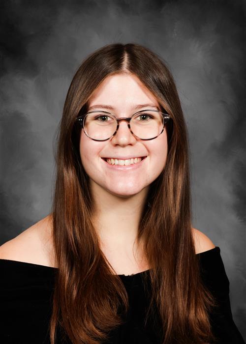 a late teens girl smiling