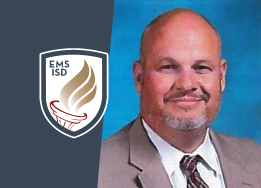  Shield logo with portrait of Chris Mogan