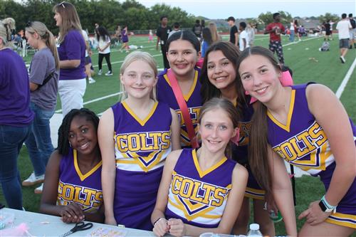 A group of cheerleaders together