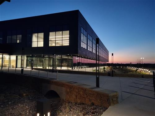 a building at sunset
