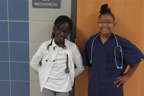 students dressed as medical professionals