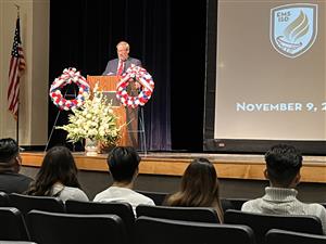 President Newcom addresses audience