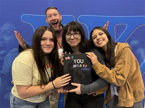 Yearbook staffer Anna Kelly, Adviser Cliff Hamilton and editors Sarah Dancer and Nadia Heth 