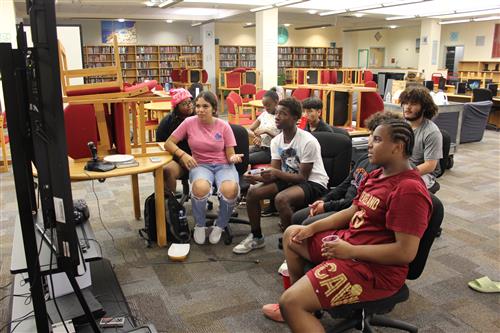 Students play a video game