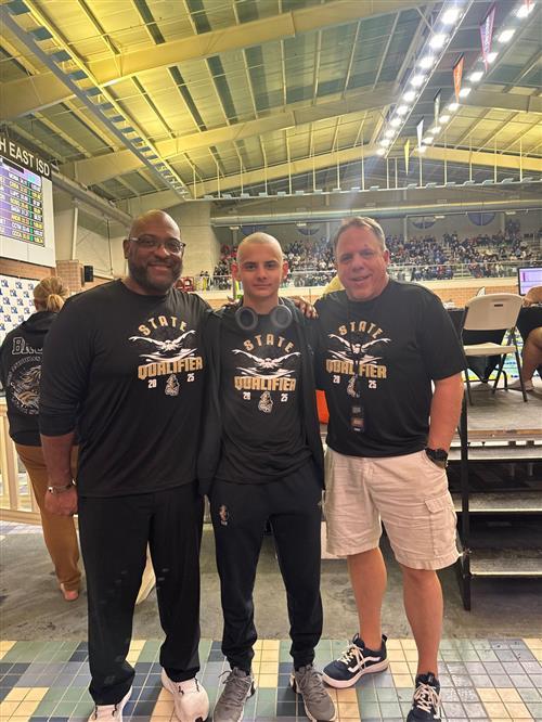 EMHS Tavin Nevill with his EMHS swim coaches