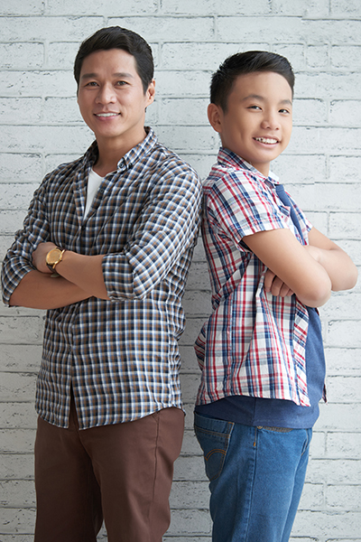 Parent and student stand side by side