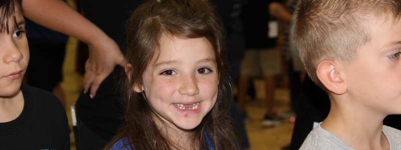 Young student smiles