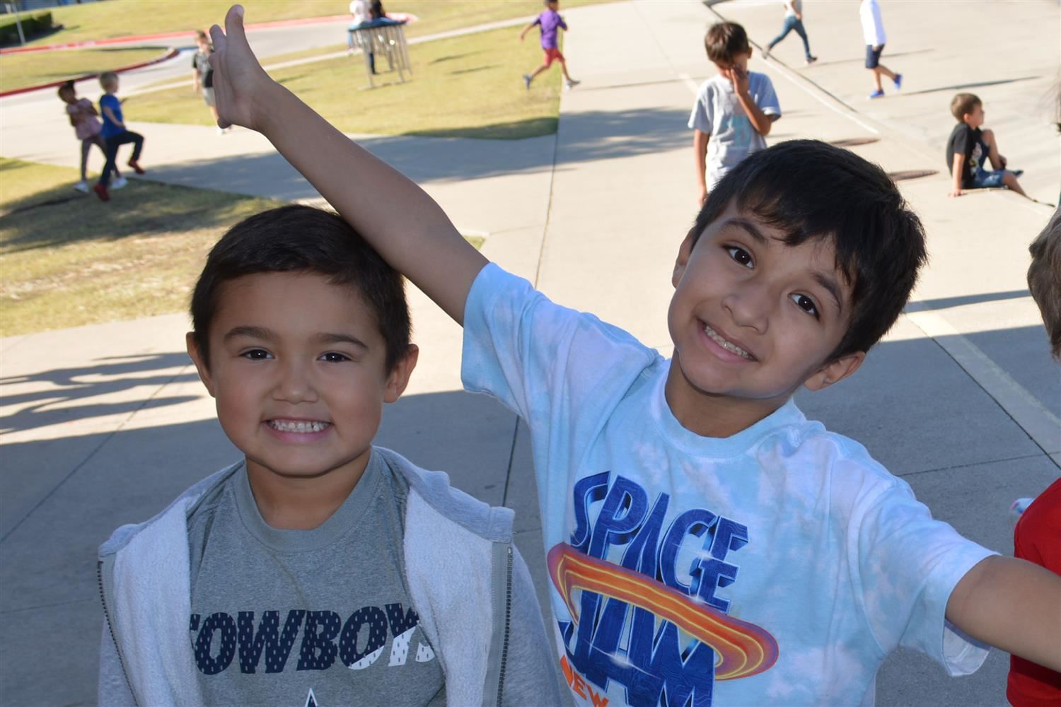students smiling outside