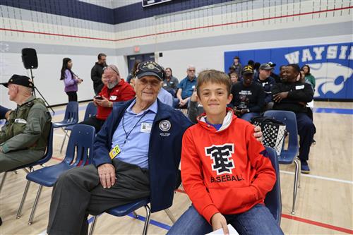 gVeteran grandfather and grandson at Wayside