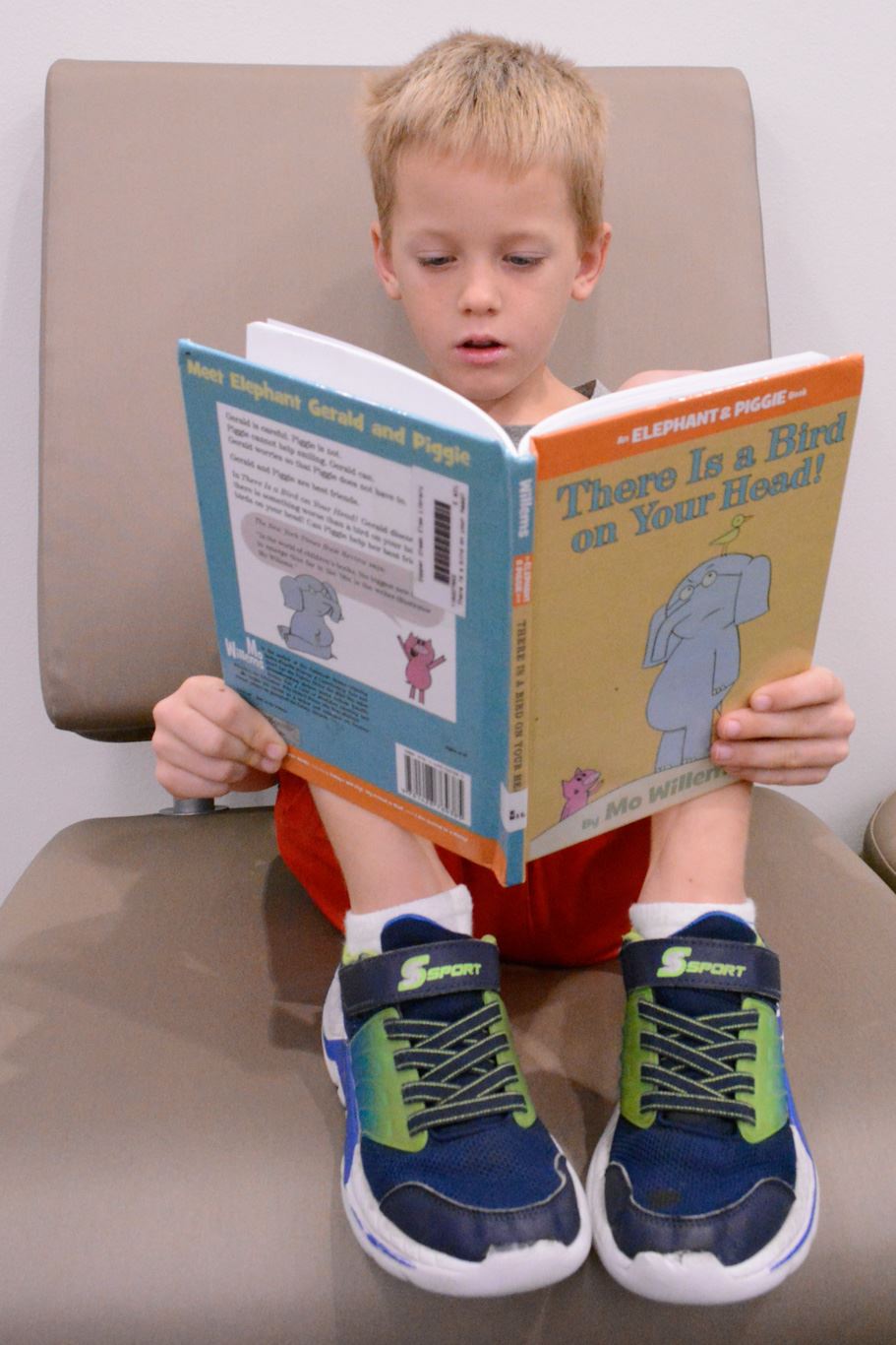 student reading in the library