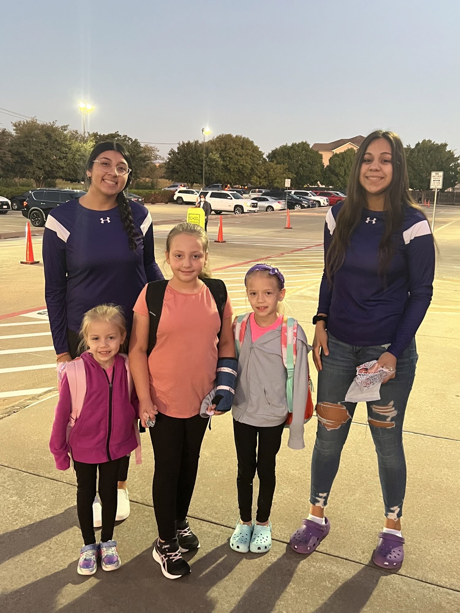 three RPE students pose with two CTHS students